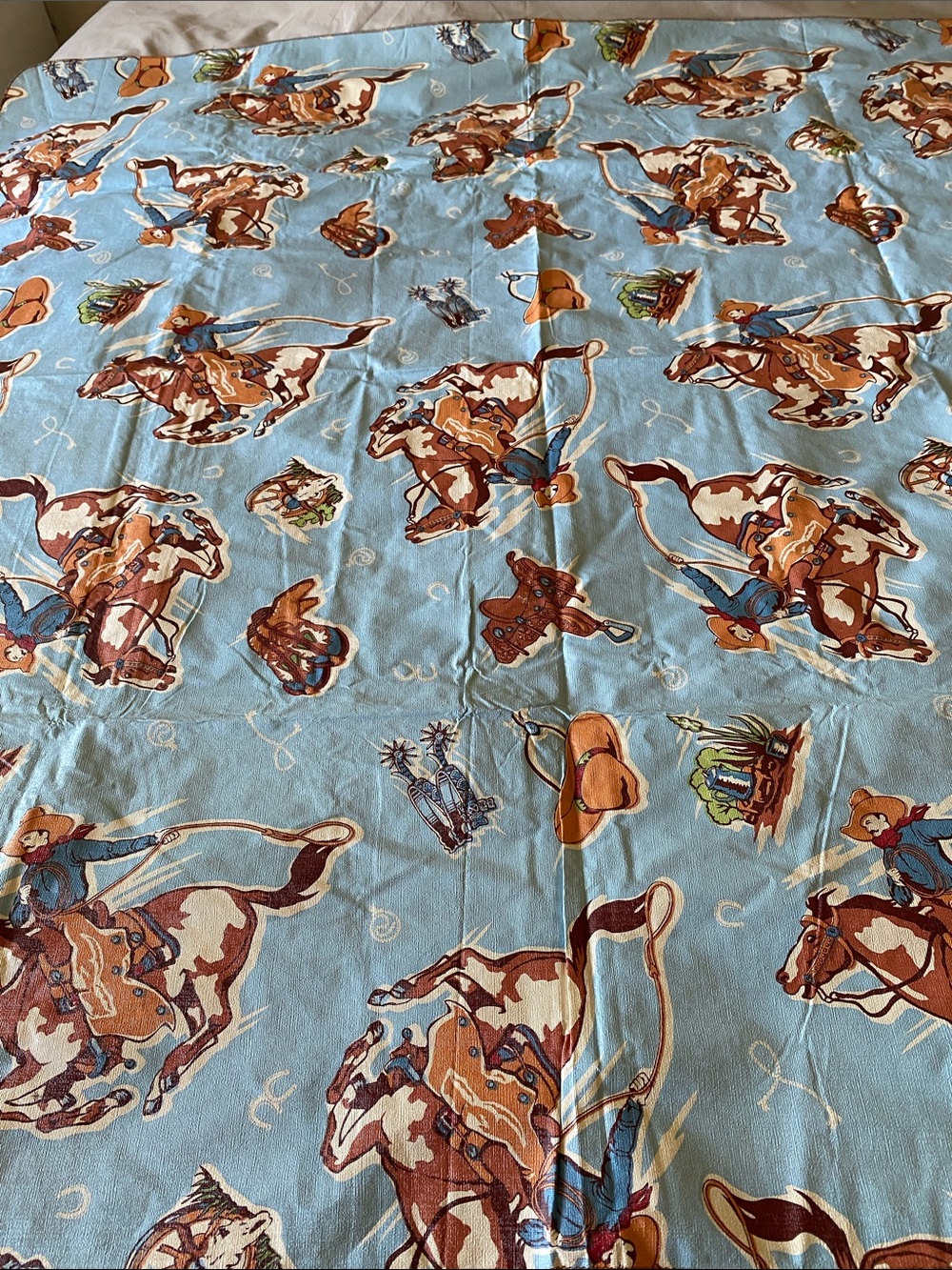 Vintage 1950-60s Cowboy Rodeo Print Blue Plastic Tablecloth